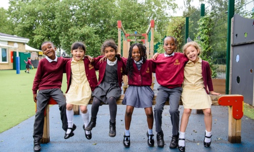 A photo of some of our students in the playground to advertise our video virtual tour on this website.