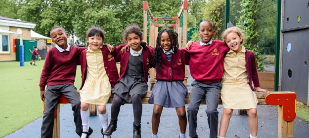 A photo of some of our students in the playground to advertise our video virtual tour on this website.